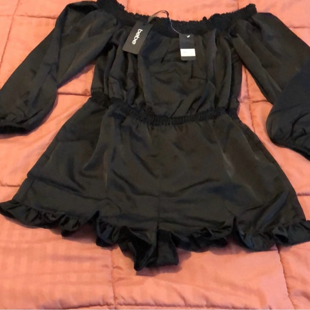 BEBE off the shoulder romper.  size M. black NWT